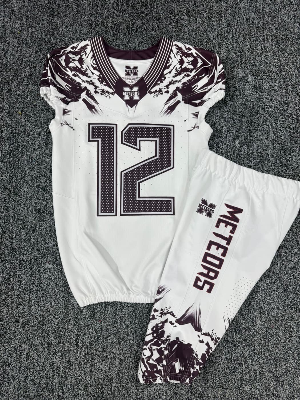 Custom football uniform Seamline made for the Meteors
